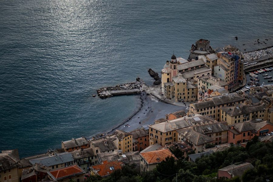Aerial view of a historic Italian harbor town on the Mediterranean
